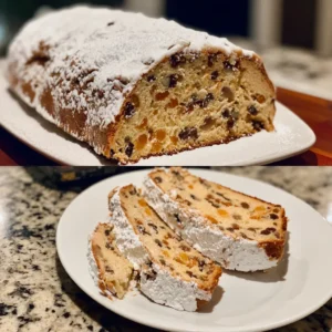 Authentic Stollen (German Christmas Bread) 2 A beautifully presented Christmas stollen recipe, dusted with powdered sugar, showing a whole loaf and sliced portions revealing dried fruits and nuts.