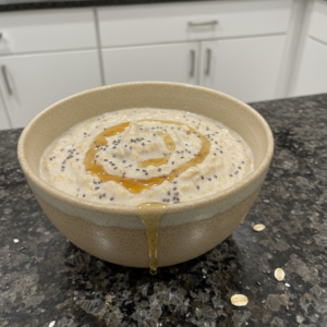 Creamy Overnight Oats in a jar, topped with fresh berries and a drizzle of honey, ready for a healthy breakfast.