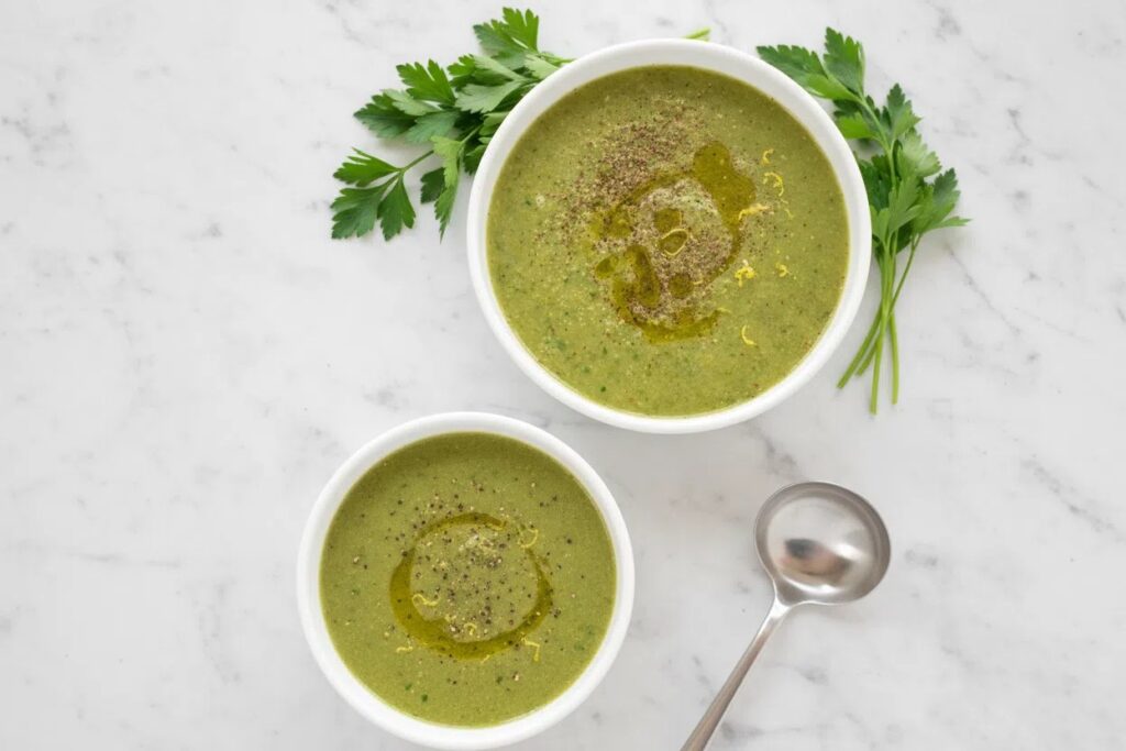 Bielers Blended Vegetable Soup served in a minimalist ceramic vessel on a white marble surface, ready for a wellness lunch.