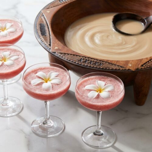 A kava drink recipe prepared with a lipid-enhanced knead, served in a minimalist ceramic bowl on white marble.