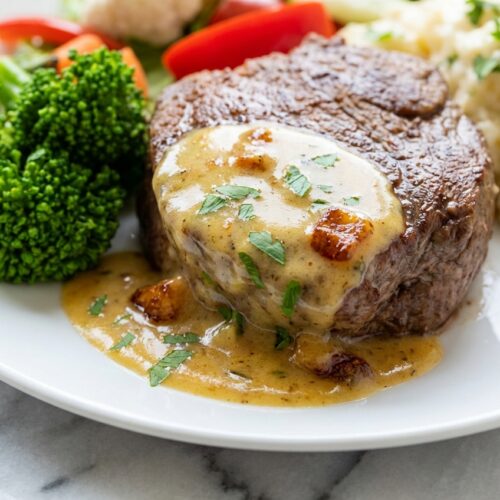 Beef Fillet with Easy Bearnaise Sauce featuring a brown butter infusion on a minimalist ceramic plate.